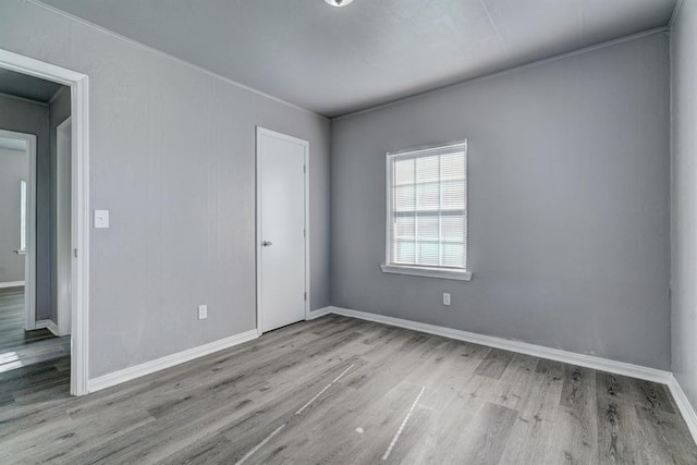 2132 N Rhode Island Ave, Oklahoma City, OK 73111 - empty room with wood finished floors and baseboards