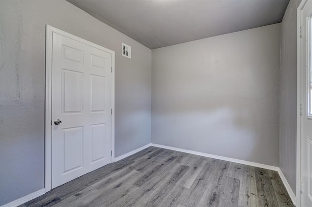 2132 N Rhode Island Ave, Oklahoma City, OK 73111 - unfurnished room with wood finished floors and baseboards