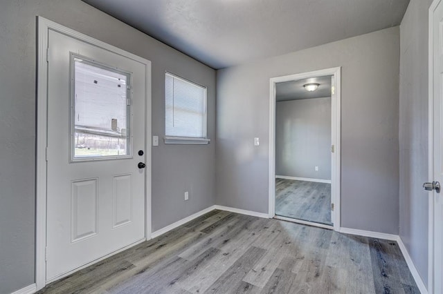 2132 N Rhode Island Ave, Oklahoma City, OK 73111 - foyer featuring wood finished floors and baseboards