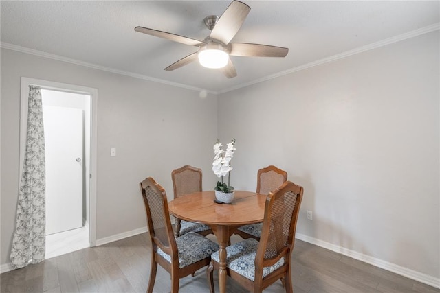 6100 N Brookline Ave Unit 20, Oklahoma City, OK 73112 - dining room with wood finished floors, crown molding, and ceiling fan