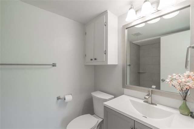 6100 N Brookline Ave Unit 20, Oklahoma City, OK 73112 - bathroom featuring vanity and toilet