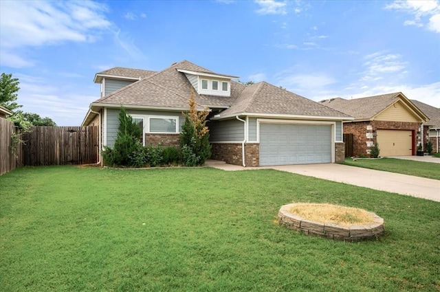 2020 Sara Vista Dr, Yukon, OK 73099 - view of front of home featuring an attached garage, brick siding, concrete driveway, and a shingled roof