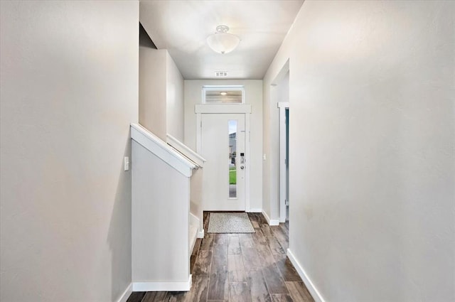 2020 Sara Vista Dr, Yukon, OK 73099 - doorway to outside featuring baseboards and dark wood-style floors