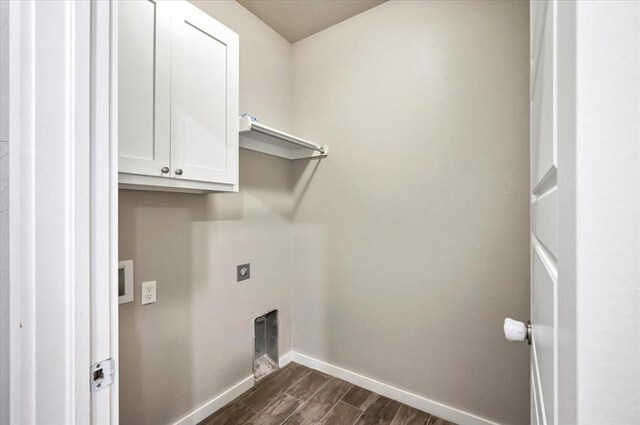 2020 Sara Vista Dr, Yukon, OK 73099 - laundry area with cabinet space, dark wood-type flooring, electric dryer hookup, and hookup for a washing machine