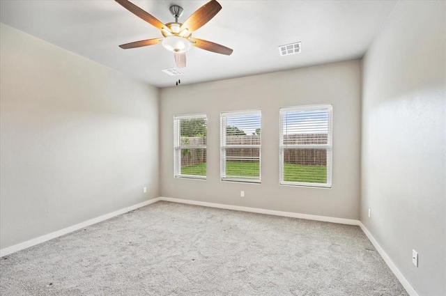2020 Sara Vista Dr, Yukon, OK 73099 - carpeted empty room with ceiling fan and baseboards