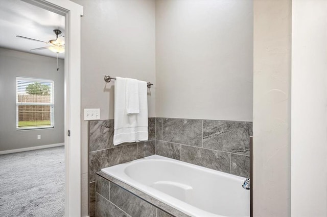 2020 Sara Vista Dr, Yukon, OK 73099 - bathroom featuring ceiling fan and a garden tub