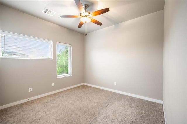 2020 Sara Vista Dr, Yukon, OK 73099 - spare room featuring carpet and ceiling fan