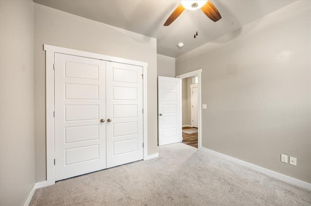 2020 Sara Vista Dr, Yukon, OK 73099 - unfurnished bedroom featuring carpet floors, a closet, and a ceiling fan