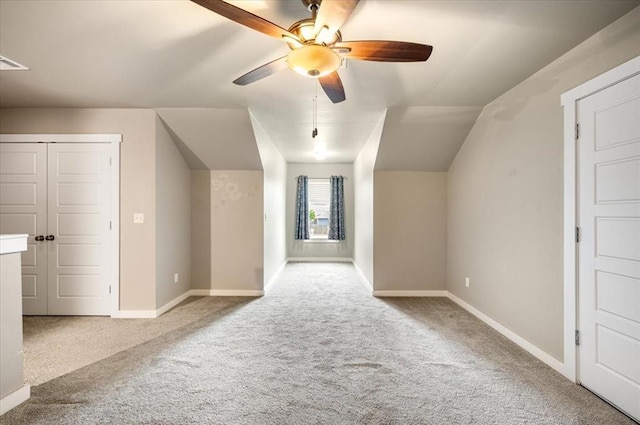 2020 Sara Vista Dr, Yukon, OK 73099 - additional living space featuring carpet flooring, a ceiling fan, and lofted ceiling