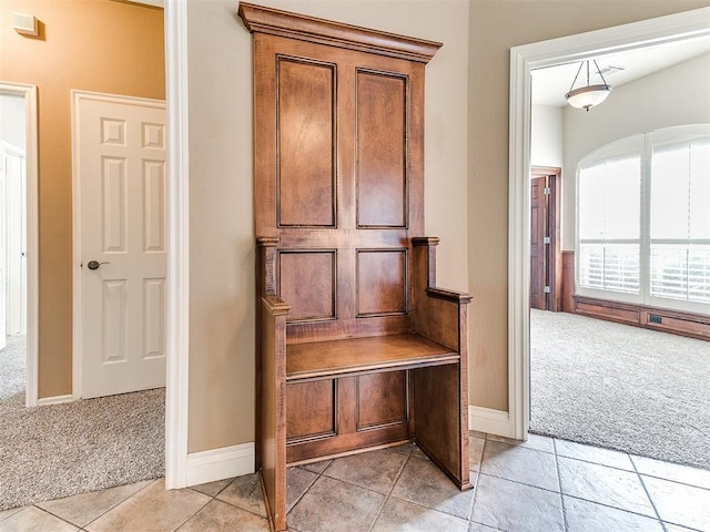 112 Lakeview Ct, Edmond, OK 73003 - mudroom featuring light carpet and light tile patterned floors