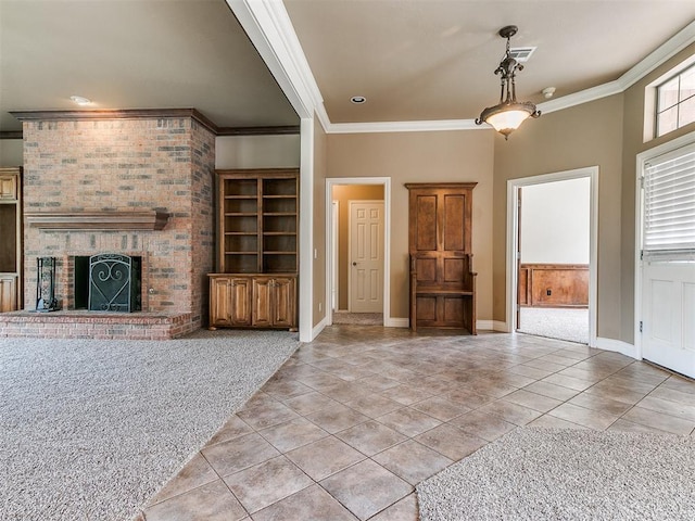 112 Lakeview Ct, Edmond, OK 73003 - unfurnished living room with light tile patterned floors, ornamental molding, and a brick fireplace
