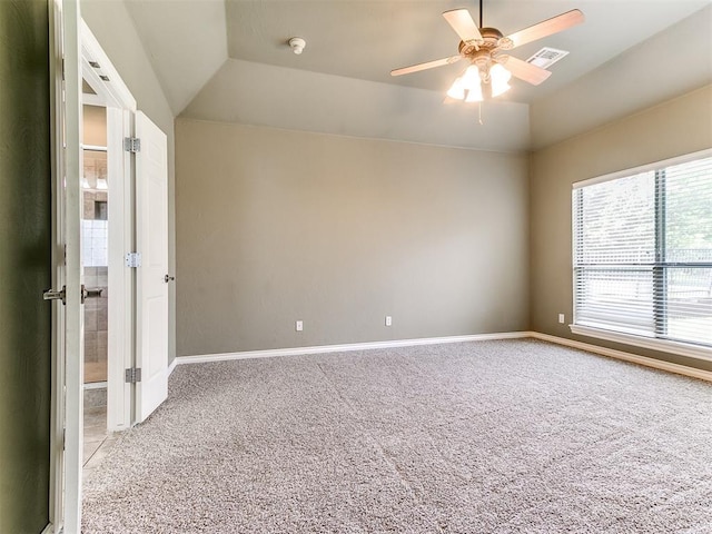 112 Lakeview Ct, Edmond, OK 73003 - unfurnished room with light carpet, vaulted ceiling, a ceiling fan, and a smoke detector
