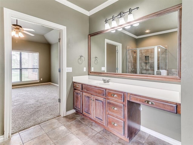 112 Lakeview Ct, Edmond, OK 73003 - full bath with vanity, a stall shower, ceiling fan, crown molding, and tile patterned flooring