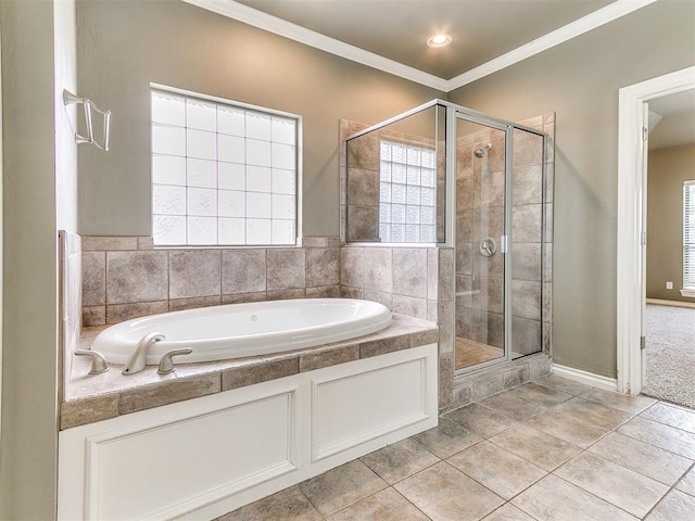 112 Lakeview Ct, Edmond, OK 73003 - bathroom with a bath, a stall shower, ornamental molding, and tile patterned floors