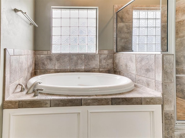 112 Lakeview Ct, Edmond, OK 73003 - full bathroom with a garden tub and a tile shower