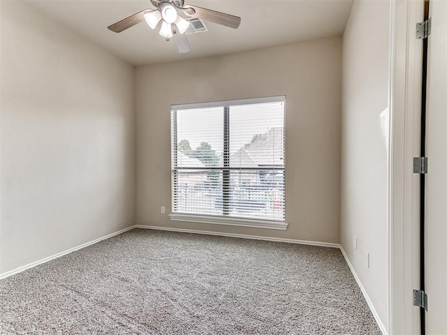 112 Lakeview Ct, Edmond, OK 73003 - carpeted spare room featuring a ceiling fan and baseboards