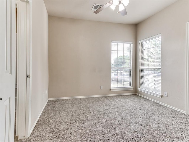 112 Lakeview Ct, Edmond, OK 73003 - spare room featuring a ceiling fan and carpet floors