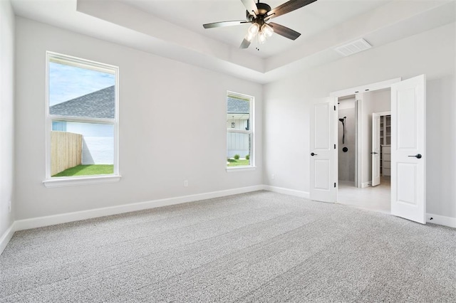 10400 SW 51st St, Mustang, OK 73064 - unfurnished bedroom with a raised ceiling and carpet