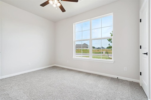 10400 SW 51st St, Mustang, OK 73064 - carpeted empty room featuring ceiling fan and baseboards