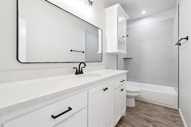 10400 SW 51st St, Mustang, OK 73064 - bathroom with vanity, recessed lighting, shower / bathtub combination, and wood finished floors