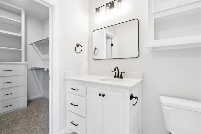 10400 SW 51st St, Mustang, OK 73064 - bathroom featuring vanity and a spacious closet