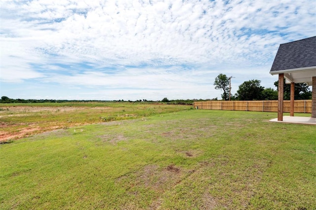 10400 SW 51st St, Mustang, OK 73064 - view of yard with a patio