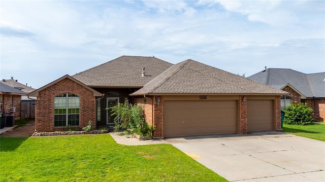 2728 SE 93rd St, Moore, OK 73160 - view of front of house with brick siding, a garage, driveway, and roof with shingles