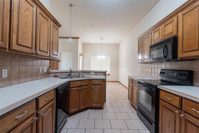 2728 SE 93rd St, Moore, OK 73160 - kitchen featuring black appliances, light tile patterned floors, backsplash, brown cabinets, and light countertops