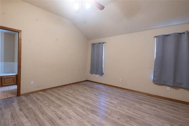 2728 SE 93rd St, Moore, OK 73160 - unfurnished room with ceiling fan, lofted ceiling, and light wood finished floors