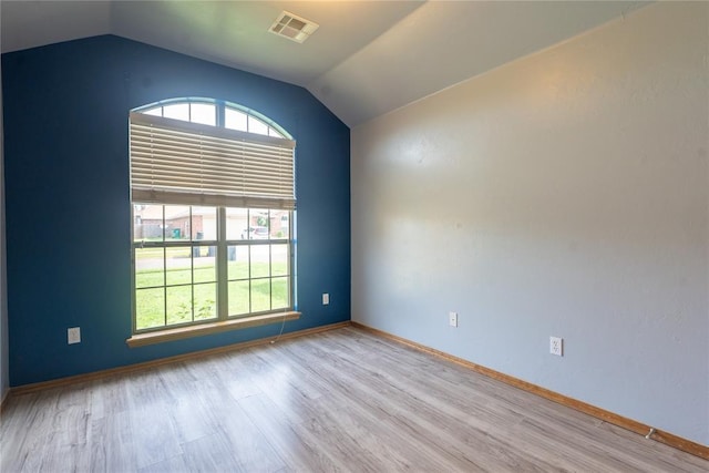 2728 SE 93rd St, Moore, OK 73160 - empty room with vaulted ceiling and wood finished floors
