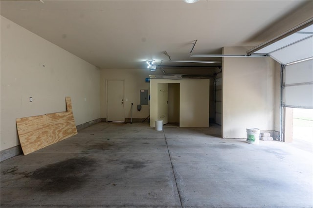 2728 SE 93rd St, Moore, OK 73160 - garage featuring electric panel and a garage door opener