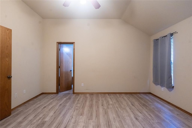 2728 SE 93rd St, Moore, OK 73160 - spare room featuring light wood finished floors, a ceiling fan, and vaulted ceiling
