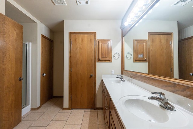 2728 SE 93rd St, Moore, OK 73160 - bathroom with double vanity, tile patterned floors, and a shower stall