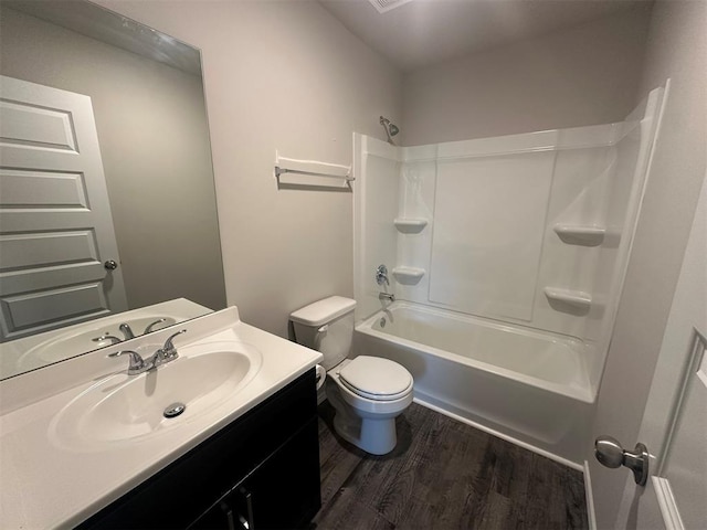 9505 Saddle Dr, Yukon, OK 73099 - full bath with wood finished floors, vanity, and shower / tub combination