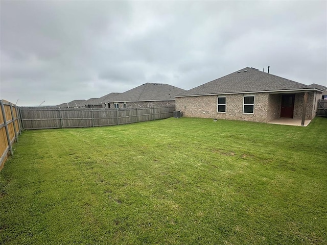 9505 Saddle Dr, Yukon, OK 73099 - fenced backyard featuring a patio area