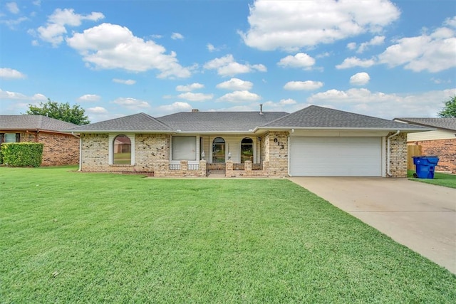 813 Tottingham Rd, Anadarko, OK 73005 - ranch-style home with a porch, an attached garage, driveway, a front lawn, and brick siding