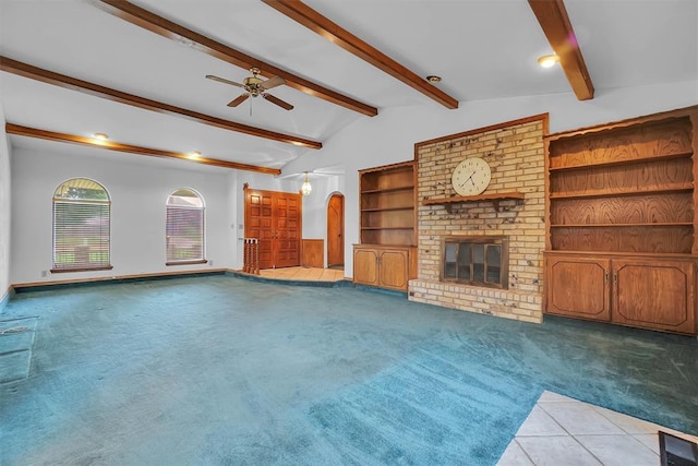813 Tottingham Rd, Anadarko, OK 73005 - unfurnished living room featuring carpet flooring, ceiling fan, a brick fireplace, and tile patterned floors