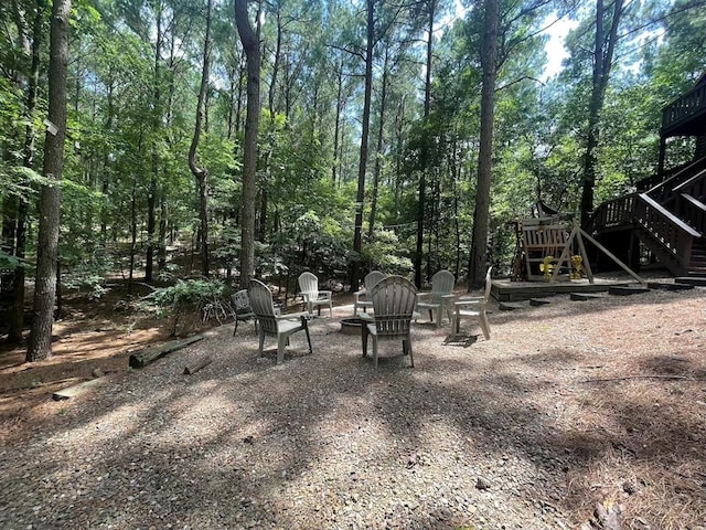 113 Bentwater Rd, Broken Bow, OK 74728 - view of yard featuring stairway and a deck