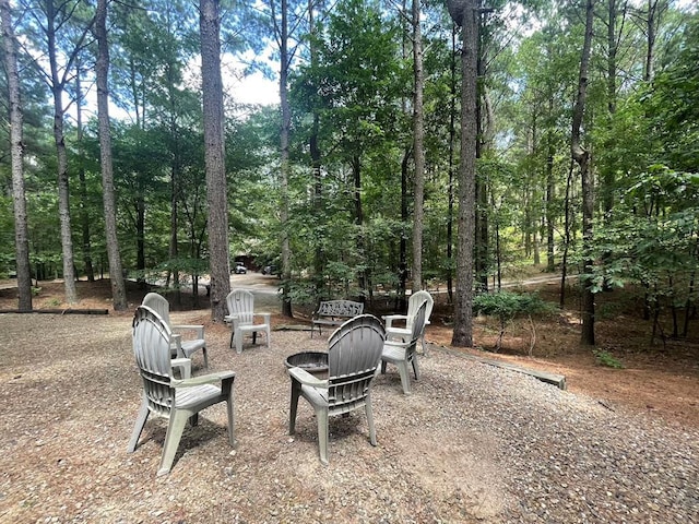 113 Bentwater Rd, Broken Bow, OK 74728 - view of patio / terrace with a fire pit