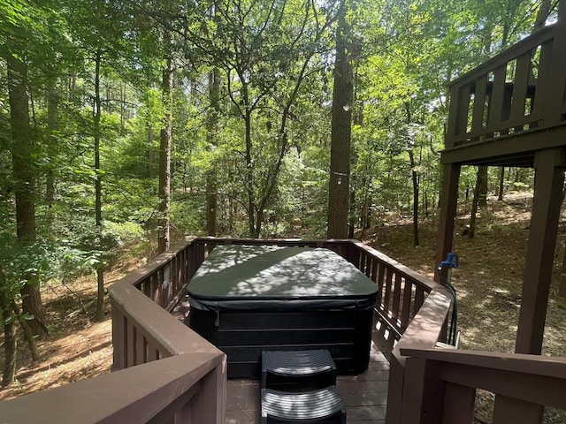 113 Bentwater Rd, Broken Bow, OK 74728 - deck with a hot tub and a wooded view