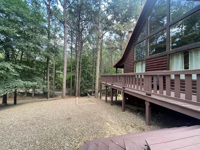 113 Bentwater Rd, Broken Bow, OK 74728 - view of yard featuring a wooden deck