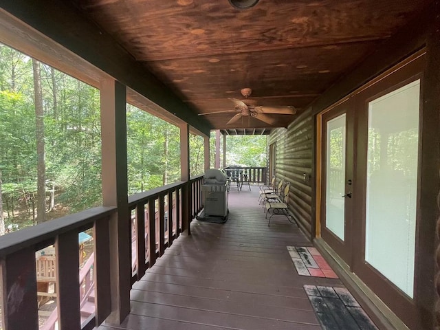 113 Bentwater Rd, Broken Bow, OK 74728 - wooden deck with a ceiling fan and a grill
