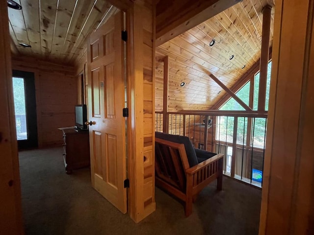 113 Bentwater Rd, Broken Bow, OK 74728 - carpeted bedroom featuring wood ceiling and wood walls
