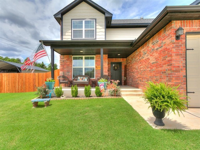 11712 Muirfield Ln, Guthrie, OK 73044 - view of front facade featuring brick siding, a porch, and an attached garage