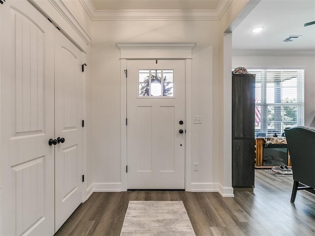 11712 Muirfield Ln, Guthrie, OK 73044 - foyer entrance with dark wood-type flooring and ornamental molding