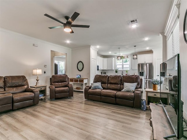 11712 Muirfield Ln, Guthrie, OK 73044 - living area featuring ceiling fan, crown molding, light wood-style flooring, and recessed lighting