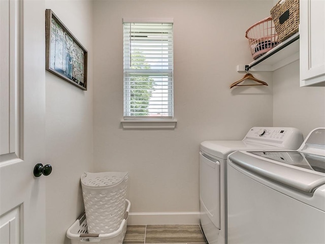 11712 Muirfield Ln, Guthrie, OK 73044 - laundry room with cabinet space and separate washer and dryer