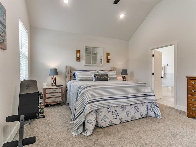 11712 Muirfield Ln, Guthrie, OK 73044 - carpeted bedroom with connected bathroom, recessed lighting, and high vaulted ceiling