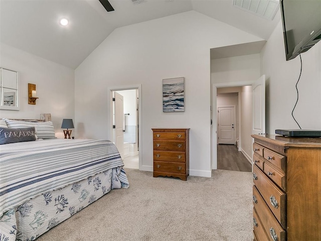 11712 Muirfield Ln, Guthrie, OK 73044 - bedroom featuring lofted ceiling, light colored carpet, connected bathroom, and a ceiling fan