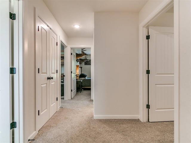 11712 Muirfield Ln, Guthrie, OK 73044 - hallway with light carpet